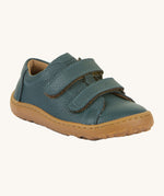 Froddo barefoot base children's shoe in petroleum. A dark turquoise natural leather low profile shoe with a 2 velcro fastener for a secure fit and a grippy sole