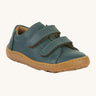 Froddo barefoot base children's shoe in petroleum. A dark turquoise natural leather low profile shoe with a 2 velcro fastener for a secure fit and a grippy sole
