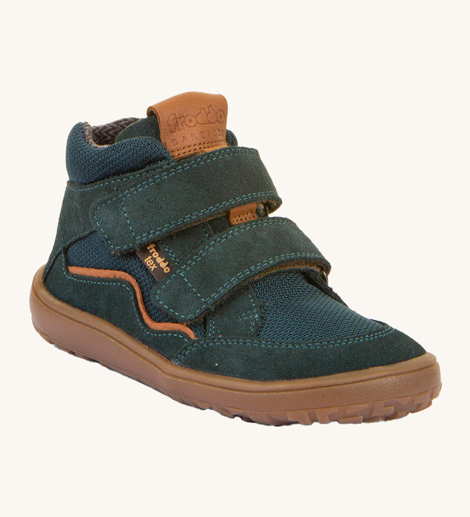 Froddo barefoot Tex Autumn children's shoe in petroleum available at Babipur. A dark turquoise shoe with 2 velcro fasteners on the front for a secure fit, padded ankle and a brown grippy sole.