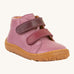 Froddo barefoot first step baby shoe in pink. A natural leather shoe with a 2 darker pink velcro fastener for a secure fit and a light brown grippy sole