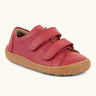 Froddo barefoot base children's shoe in red. A natural leather low profile shoe showing 2 velcro fasteners and a grippy sole