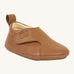 Froddo barefoot walker baby shoe in cognac. A light brown natural leather shoe with a pull tab on the back for easy fitting, a velcro fastener and a grippy sole