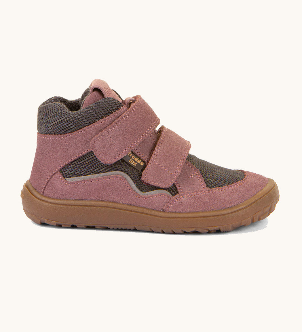 A side image of the Froddo barefoot Tex Autumn children's shoe in pink and grey available at Babipur showing 2 velcro fasteners on the front for a secure fit, padded ankle and a brown grippy sole.