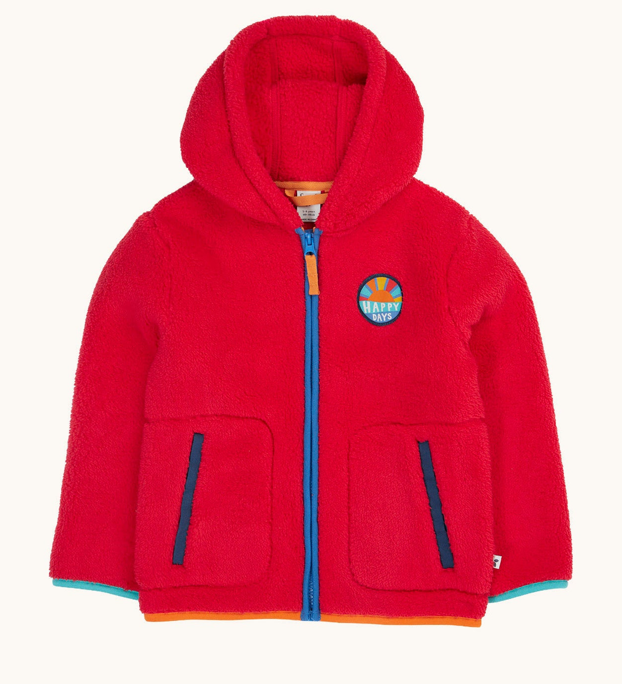 Frugi red fleece hooded children's jacket with contrasting blue zip trim and orange zip pull. Badge detail featuring the words happy days and an image of the sun on the chest. Two front pockets with navy binding. 