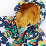 A close up of the Frugi 2 in 1 rambler  coat in magic stars. Showing the yellow fleece inner liner on the hood and zip detail.