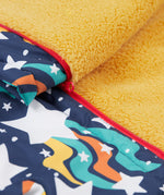 A close up of the Frugi 2 in 1 rambler coat and trousers in magic stars. Showing the yellow fleece inner liner and red zip detail separating the coat and trouser