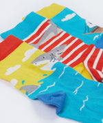 A close up of Frugi Rock My Socks 3 Pack, in the High Seas print. Featuring a bright striped pair, a blue pirate ship pair, and a brilliant shark pair.