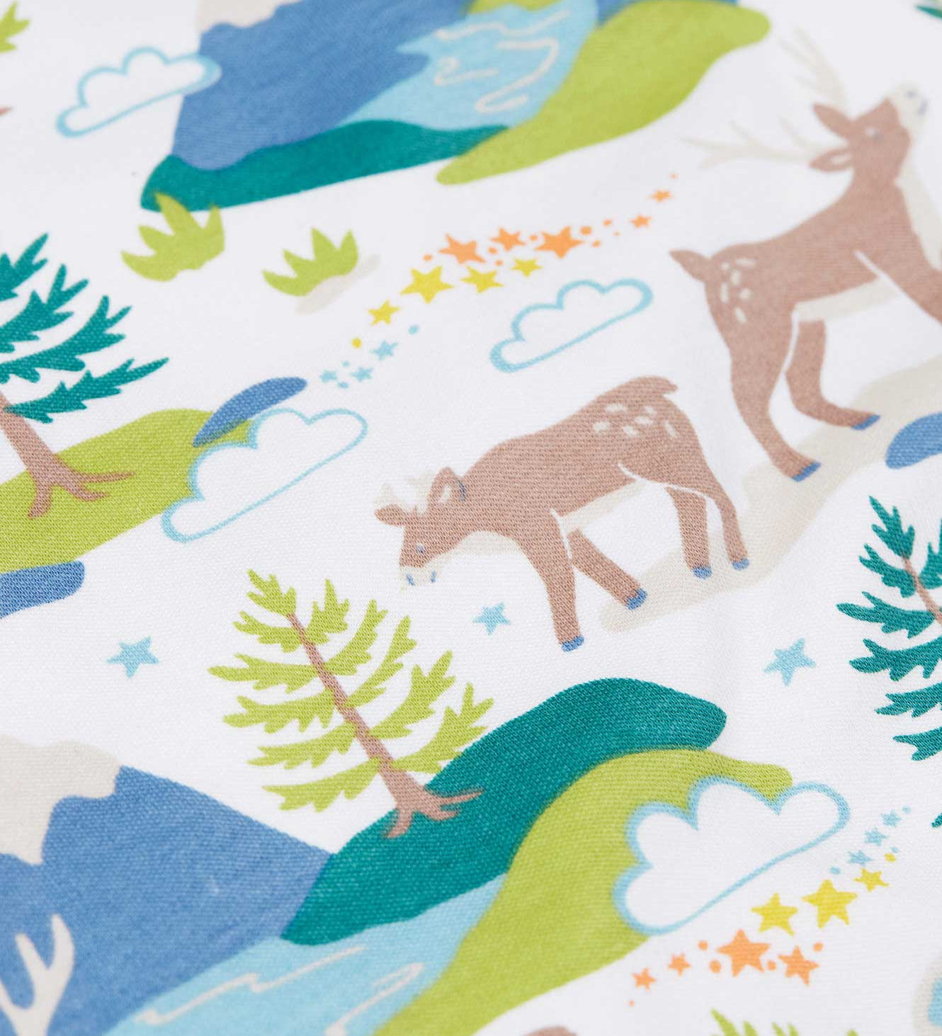 A close up of the print on the Frugi Adult organic cotton Penzance Pyjamas with an all over Caribou Fields print. These festive pyjamas have matching children's and baby sizes available here at Babipur. 