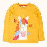 Frugi adventure circular organic cotton long sleeve top in bumblebee yellow with a white horse applique with a rainbow mane on the front surrounded by stars. 