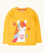 Frugi adventure circular organic cotton long sleeve top in bumblebee yellow with a white horse applique with a rainbow mane on the front surrounded by stars. 
