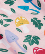 A close up of the Frugi kids pelican fun-guys amelia dress showing the playful mushroom print detail on pink organic cotton fabric.