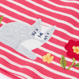 Close up of the grey cat applique on the Frugi organic cotton archer dress in rhubarb pink Breton stripes. 