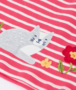 Close up of the grey cat applique on the Frugi organic cotton archer dress in rhubarb pink Breton stripes. 