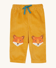 Frugi kids arlo cord trousers in gold/fox available at Babipur. A GOTS organic cotton corduroy trouser in dark yellow . Features cute fox knee patches and a blue waist drawstring cord