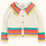 Frugi aurora collar cardigan in natural cream with rainbow stripe detail on bottom, cuffs and collar. Button up front closure.