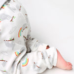 A closer look of the white cuffed sloth and rainbow pull ups with a folded waistband
