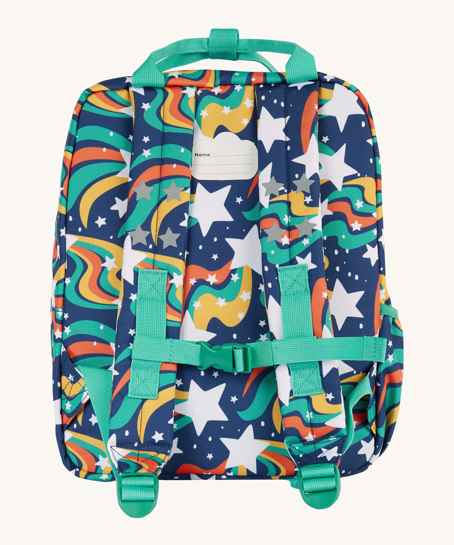 The back of the Frugi magic stars explorers backpack. Features a strap with buckle connecting the two shoulder straps for a secure fit and handy carry handle on top 