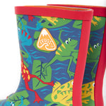 A close up of the top of the Frugi kids puddle buster wellington boots. Showing the the red trim and frog print detail on navy natural rubber material. Features a yellow triangular brand patch on the outside of the boot. 