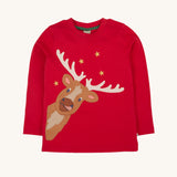 Frugi Berry Red Reindeer Terrific Circular Organic Cotton long sleeved kids Top. A red coloured children's top with a festive reindeer applique and gold stars on the front. This top is a part of a wide range of organic cotton clothing for children available here at Babipur. 
