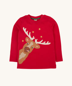 Frugi Berry Red Reindeer Terrific Circular Organic Cotton long sleeved kids Top. A red coloured children's top with a festive reindeer applique and gold stars on the front. This top is a part of a wide range of organic cotton clothing for children available here at Babipur. 
