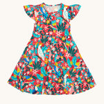 Frugi Morwenna Skater Dress in the Birds Of Paradise print, laid flat. Featuring different exotic birds surrounded by colourful flowers and leaves on a pink background.