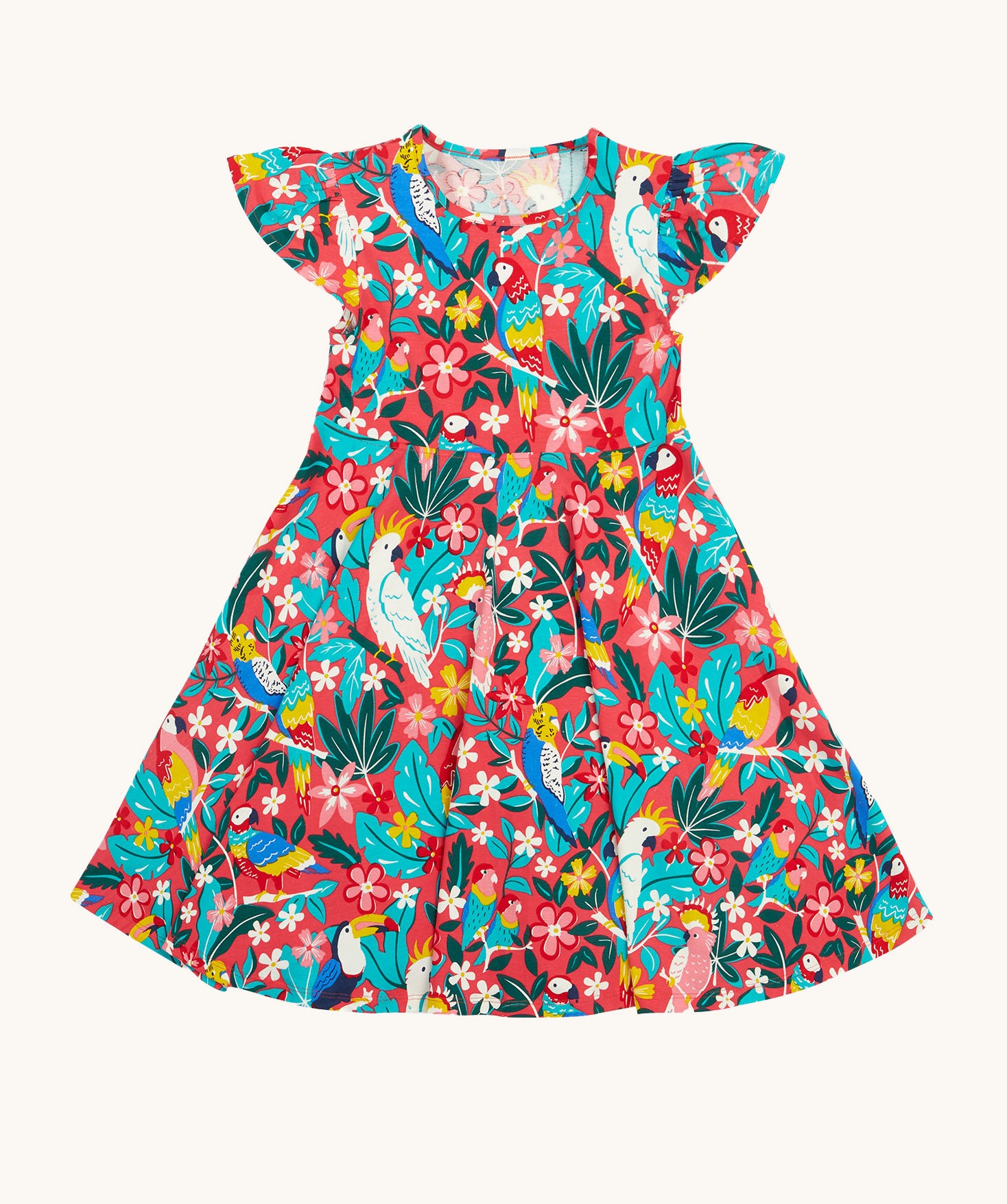 Frugi Morwenna Skater Dress in the Birds Of Paradise print, laid flat. Featuring different exotic birds surrounded by colourful flowers and leaves on a pink background.