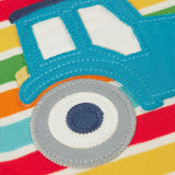 A super close up of the wheels on the tractor applique showing the stitched details. 