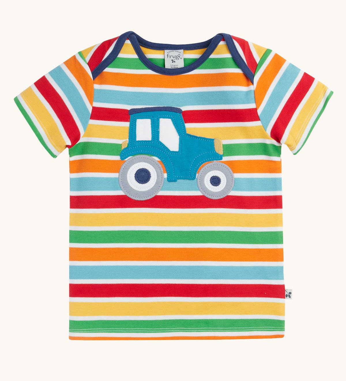 Frugi blue tractor applique rainbow striped t-shirt. Bands of red, light yellow, green, orange and light blue in-between thinner white stripes.