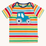 Frugi blue tractor applique rainbow striped t-shirt. Bands of red, light yellow, green, orange and light blue in-between thinner white stripes.
