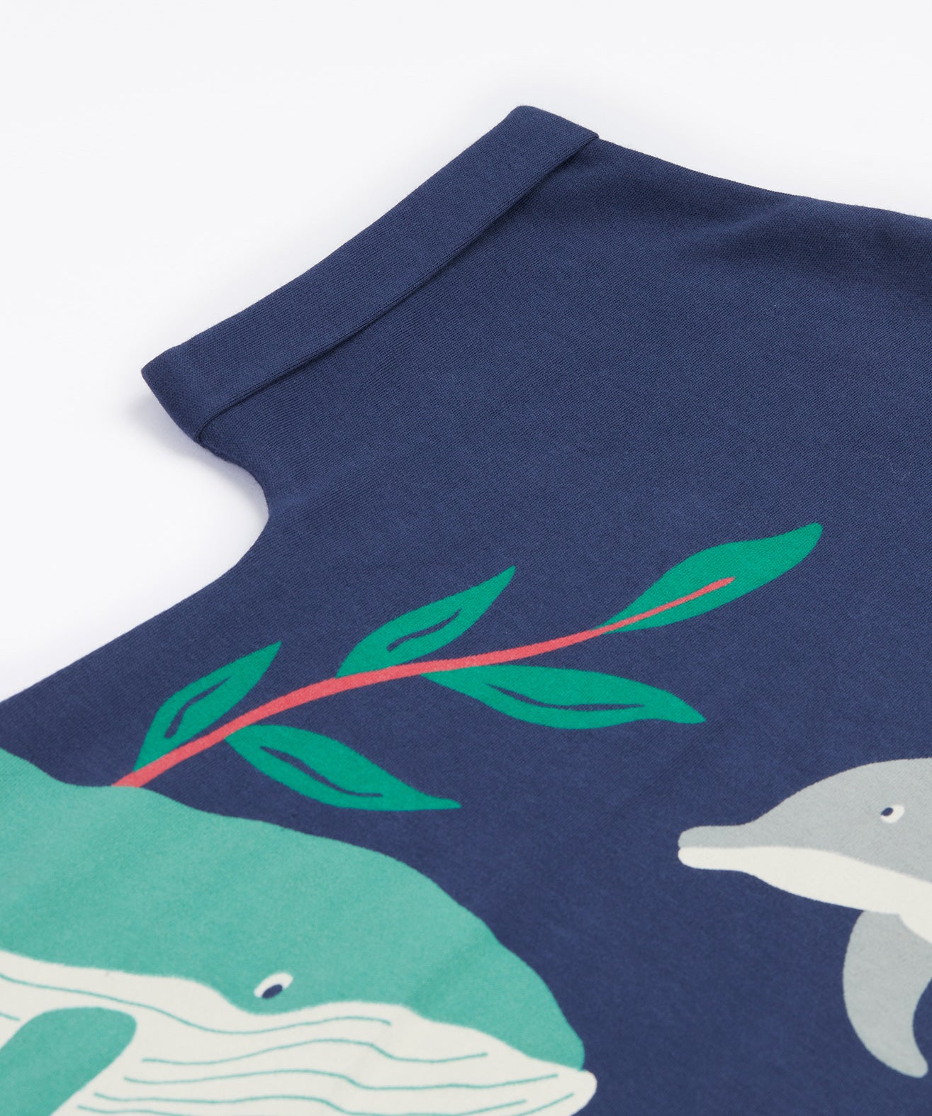 A close up of Frugi Bonnie Dress in Navy Blue's folded sleeve.