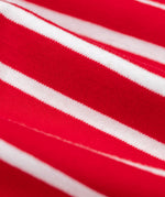 A close up of the red and white breton stripe Frugi breton campervan design organic cotton jamie jim jams long sleeved pyjamas.