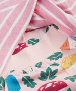 A close up of the top from the frugi kids brooke easy dressing baby grow in fun-guys/pink stripe showing the woodland inspired prints on the bottoms and the soft elasticated waist band detail