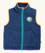 A blue frugi fleece vest with a high collar, front zipper, and two front pockets. It features yellow piping along the armholes, an orange inner collar, a teal zipper.