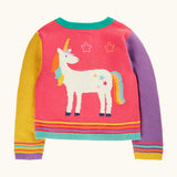 Back of the Frugi organic cotton cammie cardigan with a hotchpotch unicorn design. One purple, one yellow arm, pink back with a large unicorn on the back. 