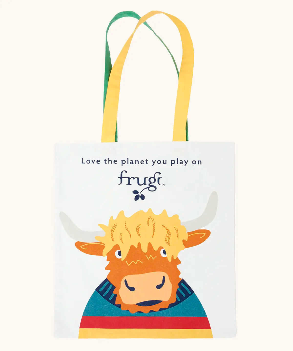 Frugi canvas tote bag in soft white with one yellow and one green strap and a highland coo cow design on the front.