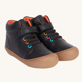 Frugi cape stretch children's lace boot in black leather with salamander orange leather lining.  The boots have a brown natural rubber coloured sole and toe bumper.