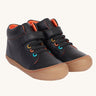Frugi cape stretch children's lace boot in black leather with salamander orange leather lining.  The boots have a brown natural rubber coloured sole and toe bumper.