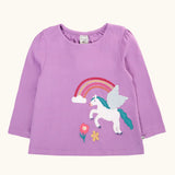 Frugi organic cotton periwinkle purple caris pegasus child's top. White pegasus applique with rainbow and flowers on a lilac long sleeved top.
