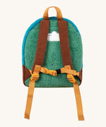 The back of the Frugi kids beary wild backpack. Showing the green fleece back panel with a name patch stitched on the top. Features brown corduroy shoulder staps with a yellow buckle for a secure fit