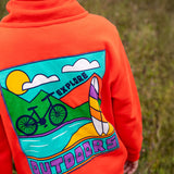 Back of Frugi Half Zip Organic Cotton Papaya orange Jumper with large Outdoors colour block style graphic. A large square filled with an outdoor scene featuring a surfboard, bike, water, mountains and sun with the word outdoors written in bold font.