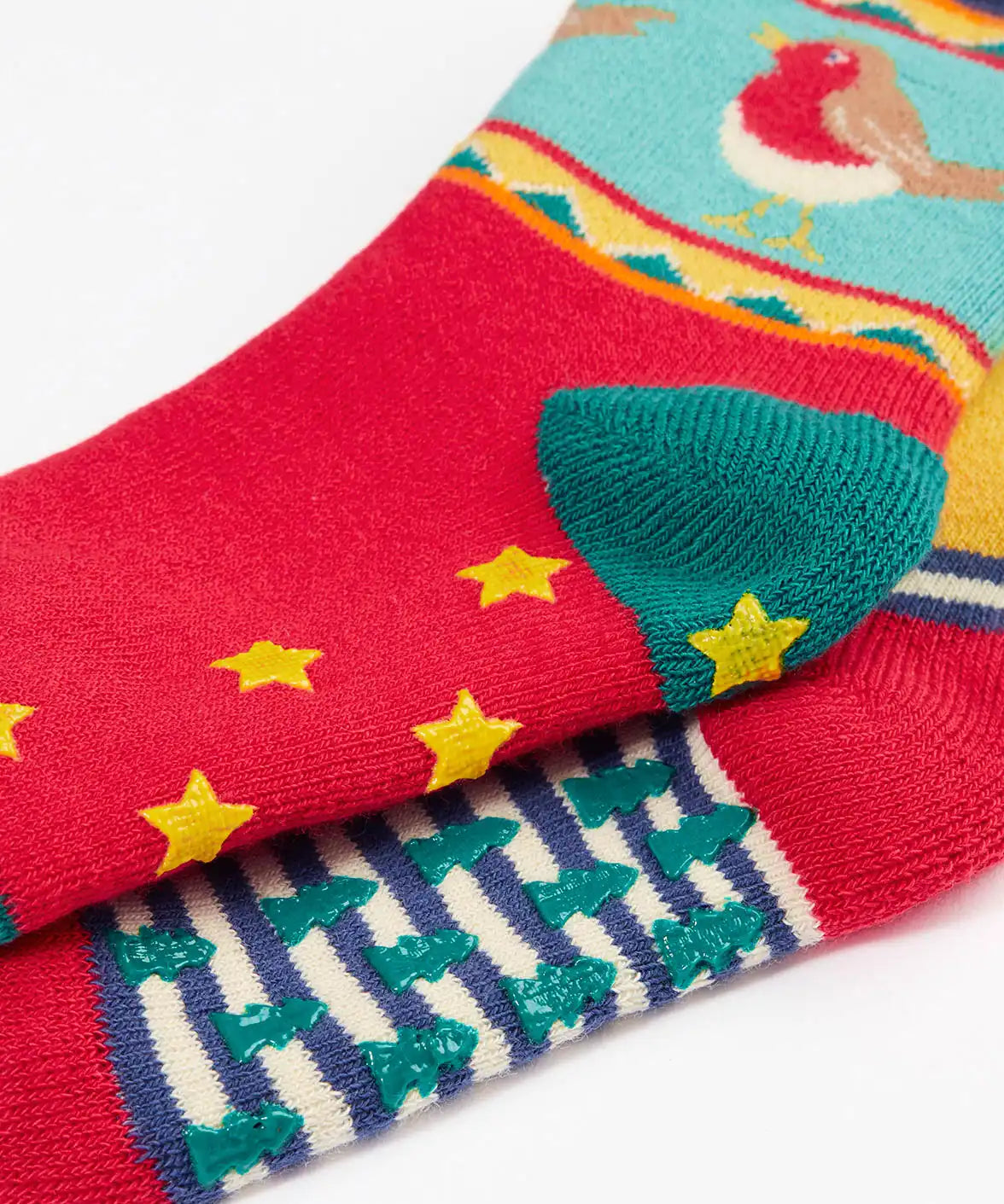 Close up of the grippy pads on the bottoms of the Frugi children's organic cotton grippy socks 2 pack fox fair isle. 