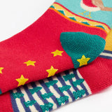 Close up of the grippy pads on the bottoms of the Frugi children's organic cotton grippy socks 2 pack fox fair isle. 