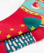 Close up of the grippy pads on the bottoms of the Frugi children's organic cotton grippy socks 2 pack fox fair isle. 