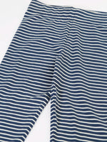 Close up of the Frugi childs organic cotton navy breton stripe leona leggings.