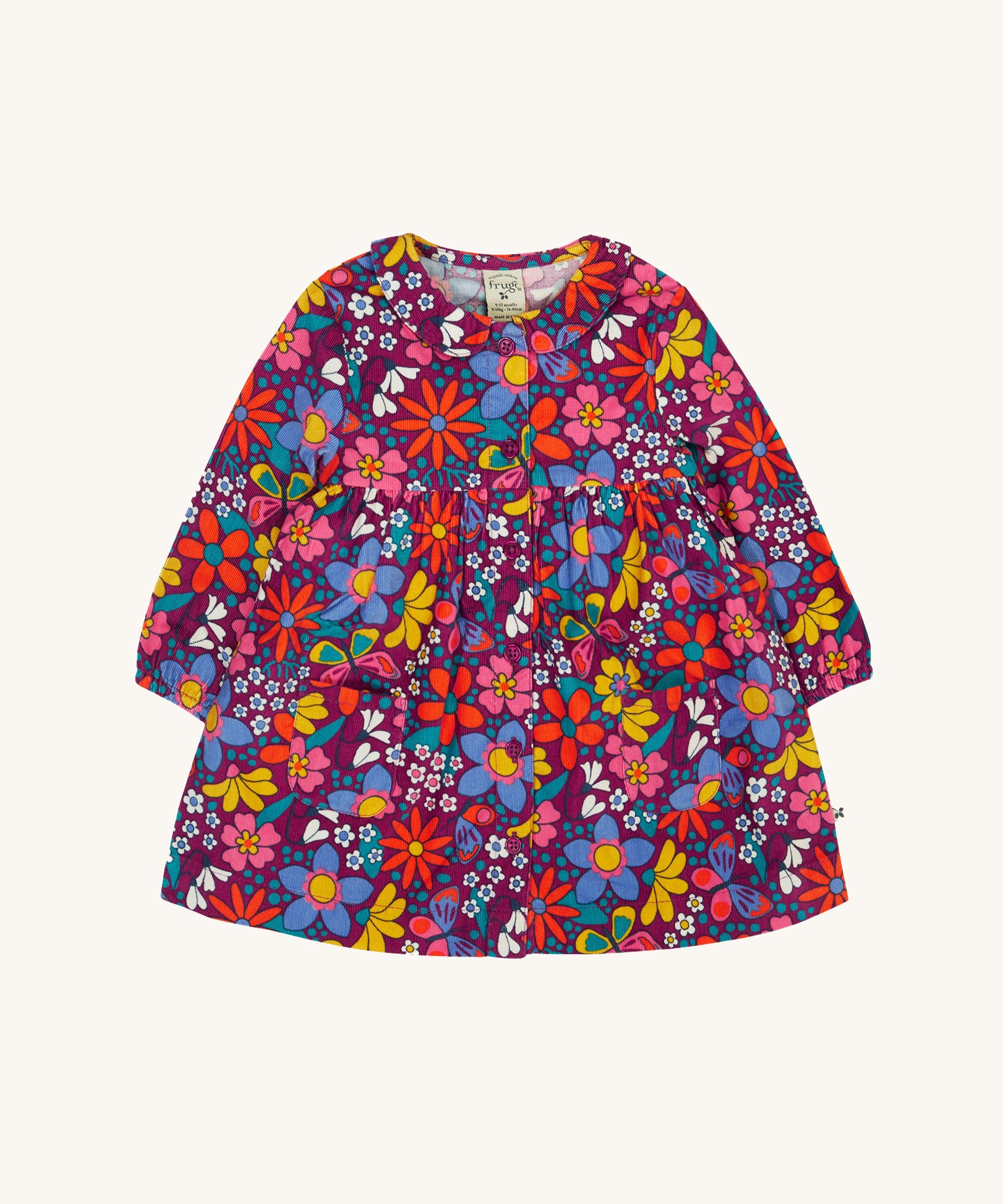 Frugi Organic Cotton Chloe Corduroy Dress for Babies and Toddlers featuring a Retro Floral print design. This dress is a part of a wide range of organic cotton clothing for children available here at Babipur.