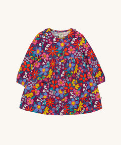 Frugi Organic Cotton Chloe Corduroy Dress for Babies and Toddlers featuring a Retro Floral print design. This dress is a part of a wide range of organic cotton clothing for children available here at Babipur.