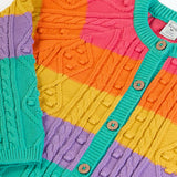 Front of the Frugi clay cable knit cardigan rainbow stripe organic cotton with button closure front.