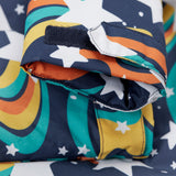 A close up of the arm cuff on the Frugi playtime magic stars coat showing the velcro detail for size adjusting.