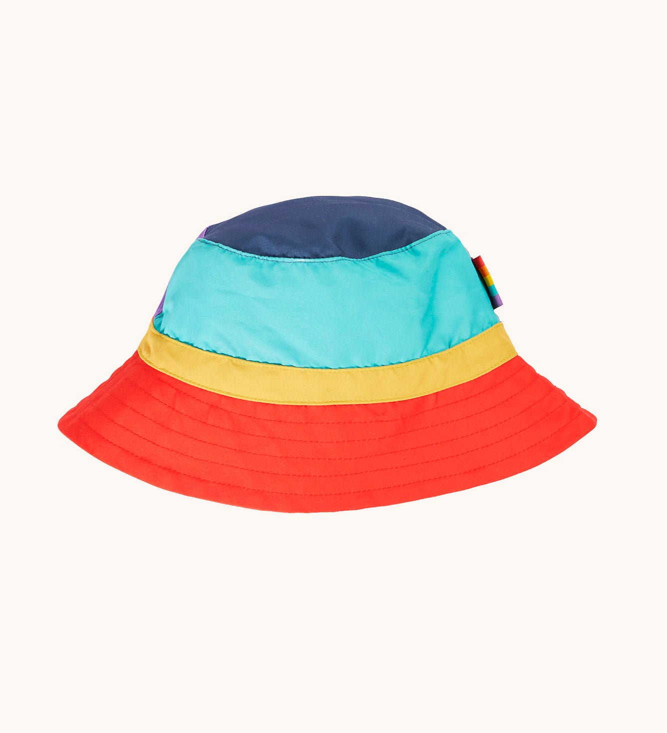 The back of the Frugi swim hat with navy, turquoise yellow and orange coloured panels.