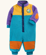 A frugi baby fleece one-piece sleeper in a color-blocked design with purple sleeves and collar, yellow upper chest, teal body, and orange patch details
